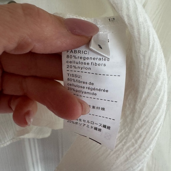 NWT SDEER Women's  Asymmetrical Blouse size small
Color- white - Picture 7 of 10